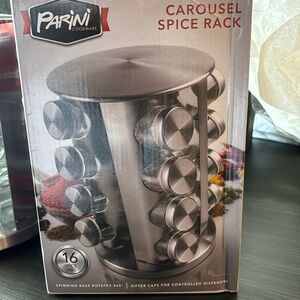 Carousel spice rack- stainless steel, 16 spice glass jars. Brand new in box.